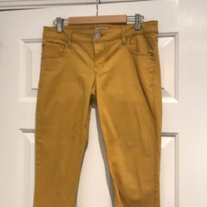 Pair of Express jeans.  Size 4. Mustard color.